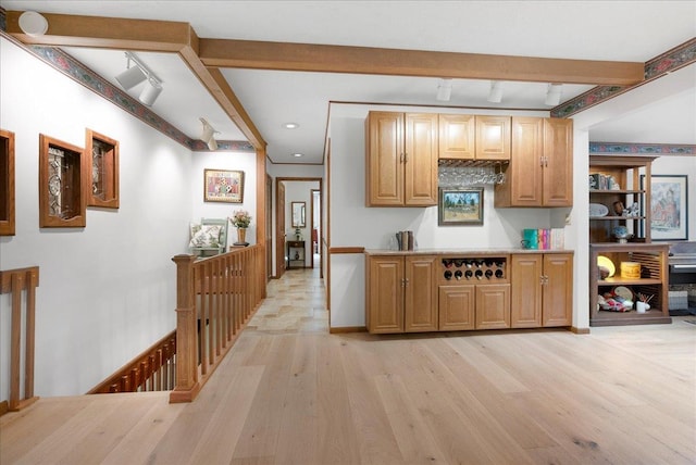 25316 E 1100 N Rd, Downs, IL 61736 - kitchen with light wood-type flooring, track lighting, beamed ceiling, light countertops, and recessed lighting