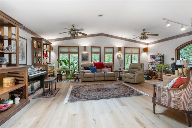 25316 E 1100 N Rd, Downs, IL 61736 - living room featuring a ceiling fan, vaulted ceiling, and wood finished floors