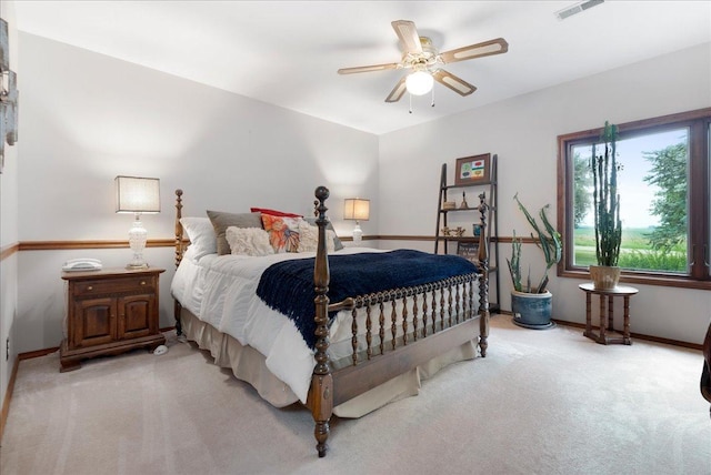 25316 E 1100 N Rd, Downs, IL 61736 - bedroom with light colored carpet and ceiling fan
