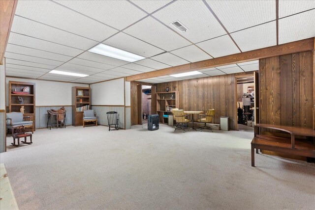 25316 E 1100 N Rd, Downs, IL 61736 - living area featuring carpet floors and wood walls