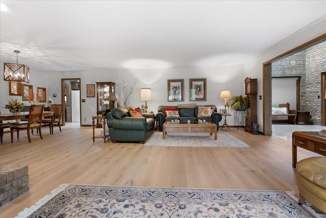 25316 E 1100 N Rd, Downs, IL 61736 - living room with a chandelier and light wood-type flooring