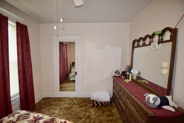 915 W Olive St, Bloomington, IL 61701 - carpeted bedroom with baseboards and ceiling fan