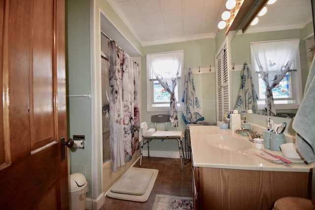 915 W Olive St, Bloomington, IL 61701 - full bathroom with ornamental molding, vanity, tile patterned flooring, and shower / bath combo with shower curtain