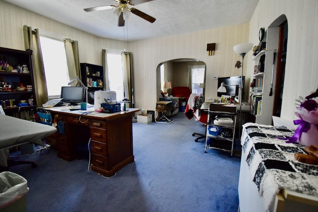915 W Olive St, Bloomington, IL 61701 - office with arched walkways, a ceiling fan, carpet, a textured ceiling, and wallpapered walls