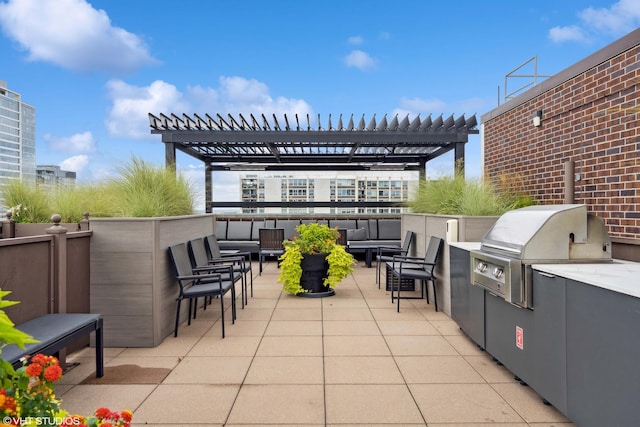 1250 N Dearborn St Unit 11C, Chicago, IL 60610 - view of patio / terrace featuring a pergola, an outdoor living space, and exterior kitchen