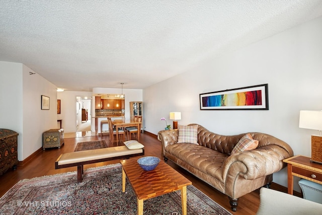 1250 N Dearborn St Unit 11C, Chicago, IL 60610 - living area featuring wood finished floors and a textured ceiling