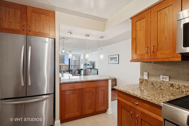 1250 N Dearborn St Unit 11C, Chicago, IL 60610 - kitchen featuring stainless steel appliances and brown cabinets