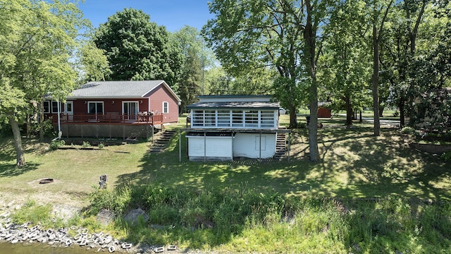 7198 S Rock Nation Rd, Dixon, IL 61021 - view of grassy yard with a deck and stairs