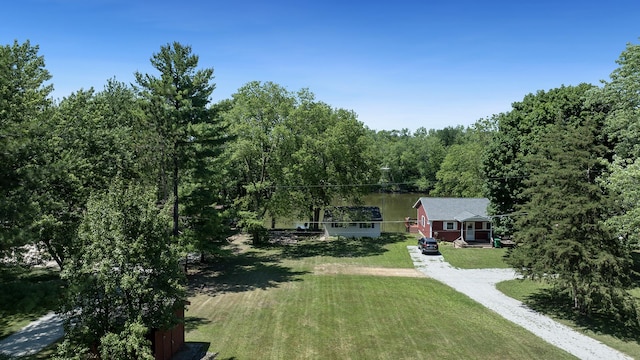7198 S Rock Nation Rd, Dixon, IL 61021 - aerial view of property and surrounding area with a heavily wooded area