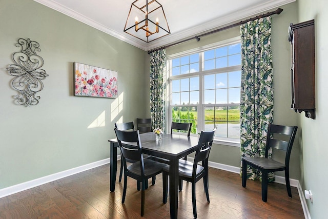 4100 Coyote Lakes Cir, Lake In The Hills, IL 60156 - dining space featuring a chandelier, crown molding, and dark wood finished floors