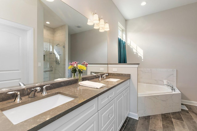 4100 Coyote Lakes Cir, Lake In The Hills, IL 60156 - full bath featuring a shower stall, a garden tub, double vanity, and recessed lighting