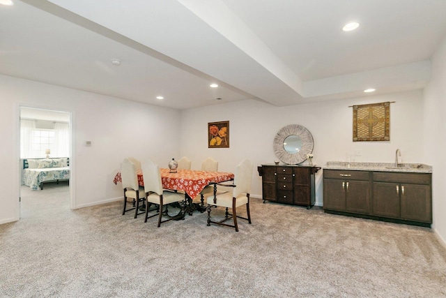 4100 Coyote Lakes Cir, Lake In The Hills, IL 60156 - dining space featuring light colored carpet, recessed lighting, and bar with sink