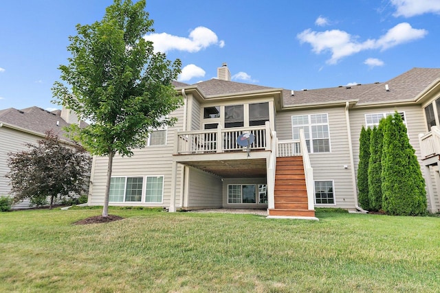 4100 Coyote Lakes Cir, Lake In The Hills, IL 60156 - back of property with stairway, a chimney, a sunroom, a wooden deck, and a yard