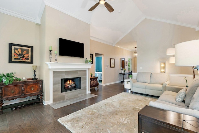 4100 Coyote Lakes Cir, Lake In The Hills, IL 60156 - living room featuring ceiling fan, wood finished floors, a fireplace, vaulted ceiling, and crown molding