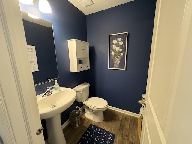 582 Spring Leaf Dr, Joliet, IL 60431 - bathroom featuring toilet and wood finished floors