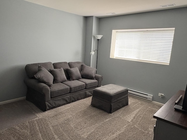 582 Spring Leaf Dr, Joliet, IL 60431 - carpeted living room with baseboard heating and baseboards