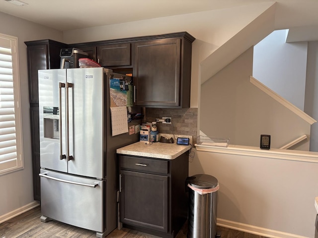 582 Spring Leaf Dr, Joliet, IL 60431 - kitchen featuring high end refrigerator, light wood-type flooring, dark brown cabinets, light countertops, and backsplash