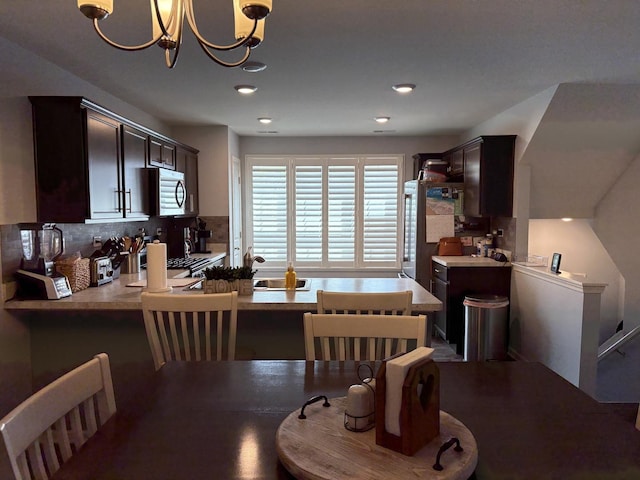 582 Spring Leaf Dr, Joliet, IL 60431 - dining room with a chandelier