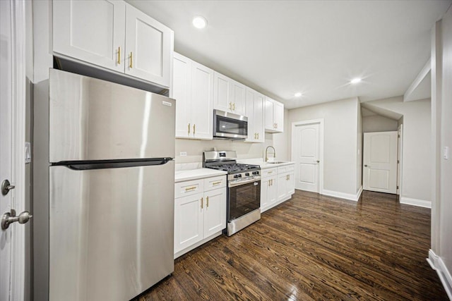 10188 S Winston Ave, Chicago, IL 60643 - kitchen with appliances with stainless steel finishes, dark wood-style flooring, white cabinetry, light countertops, and recessed lighting