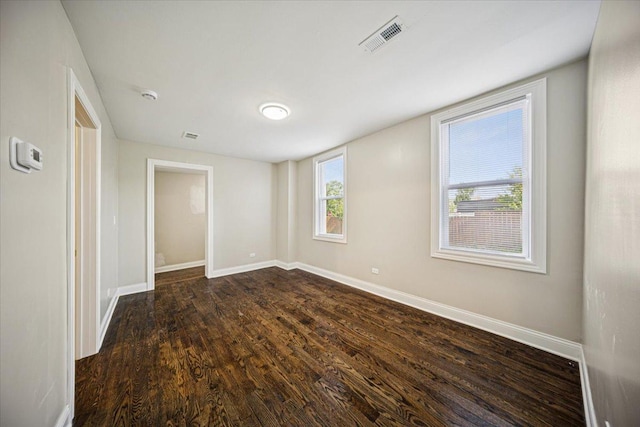 10188 S Winston Ave, Chicago, IL 60643 - empty room with dark wood-style flooring and a smoke detector