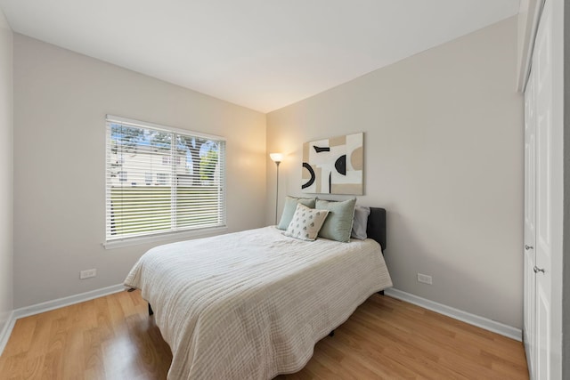 931 Mesa Dr, Elgin, IL 60123 - bedroom with light wood-type flooring and baseboards