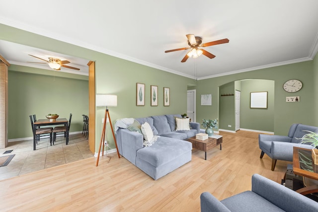 931 Mesa Dr, Elgin, IL 60123 - living area with a ceiling fan, arched walkways, ornamental molding, and light wood-style flooring