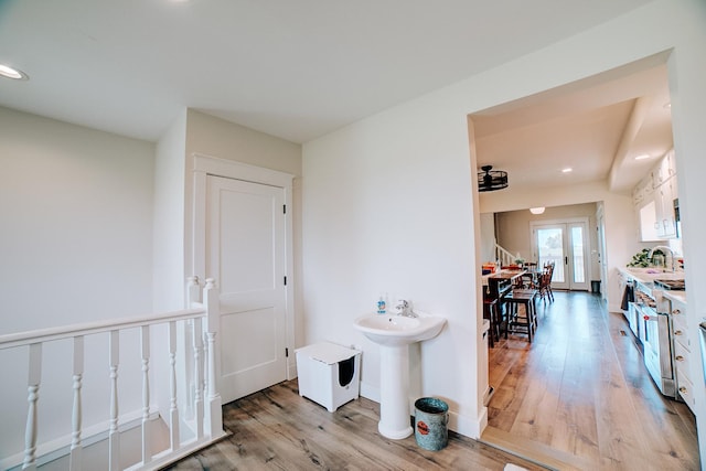 1533 E 1400 N Rd, Crescent City, IL 60928 - hallway featuring light wood-style flooring, recessed lighting, and an upstairs landing
