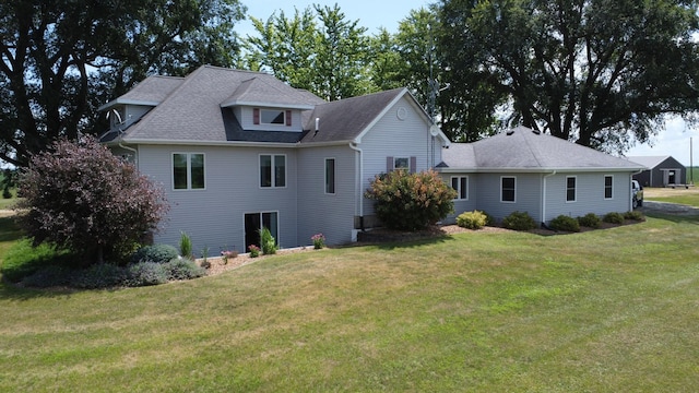 1533 E 1400 N Rd, Crescent City, IL 60928 - back of property featuring a yard and roof with shingles