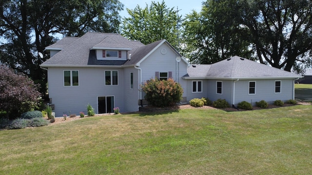 1533 E 1400 N Rd, Crescent City, IL 60928 - rear view of house with a lawn and roof with shingles
