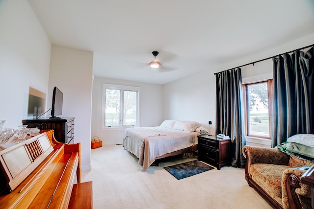 1533 E 1400 N Rd, Crescent City, IL 60928 - bedroom featuring light carpet, multiple windows, and ceiling fan