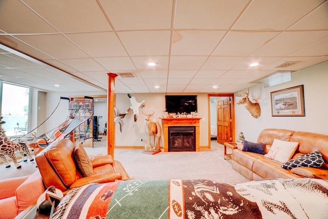1533 E 1400 N Rd, Crescent City, IL 60928 - carpeted living area featuring a drop ceiling, a fireplace, and recessed lighting