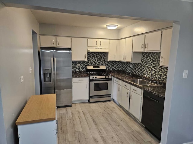 1100 E Randville Dr Unit 304, Palatine, IL 60074 - kitchen featuring stainless steel appliances, light wood-type flooring, under cabinet range hood, and tasteful backsplash