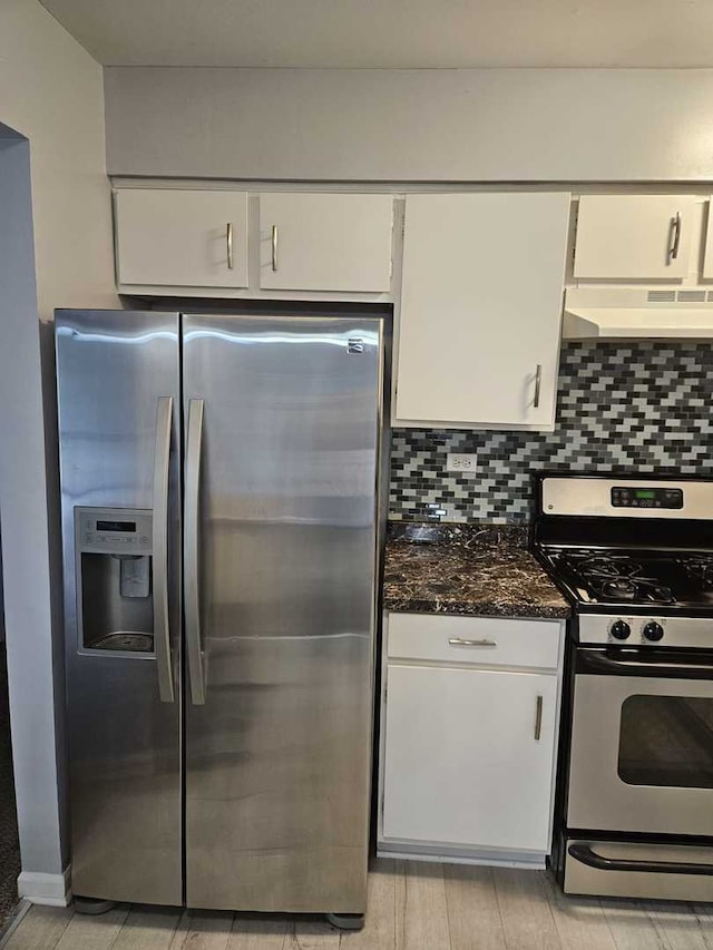 1100 E Randville Dr Unit 304, Palatine, IL 60074 - kitchen with appliances with stainless steel finishes, under cabinet range hood, white cabinets, and tasteful backsplash