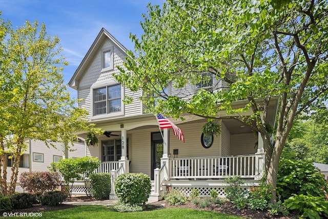 128 W Windsor Ave, Lombard, IL 60148 - victorian-style house with covered porch and ceiling fan