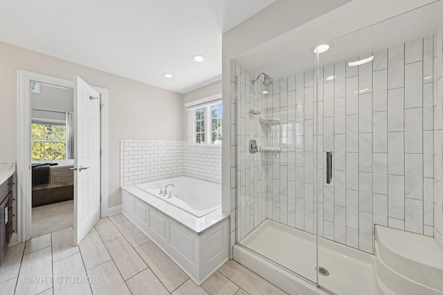 128 W Windsor Ave, Lombard, IL 60148 - full bath featuring a garden tub, a stall shower, recessed lighting, and vanity