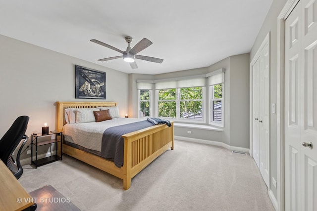 128 W Windsor Ave, Lombard, IL 60148 - carpeted bedroom featuring baseboards and a ceiling fan