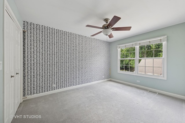 128 W Windsor Ave, Lombard, IL 60148 - carpeted spare room featuring a ceiling fan and baseboards