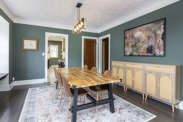 296 N Addison Ave, Elmhurst, IL 60126 - dining area with dark wood-style floors, a chandelier, and ornamental molding