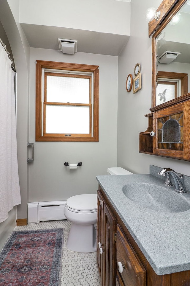 296 N Addison Ave, Elmhurst, IL 60126 - bathroom with a baseboard radiator and vanity