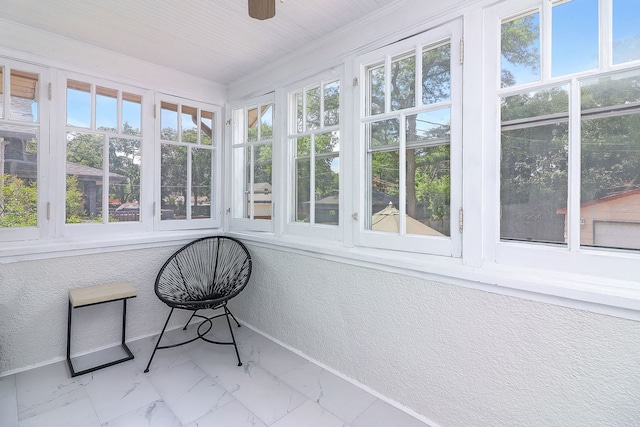 296 N Addison Ave, Elmhurst, IL 60126 - unfurnished sunroom with marble finish flooring, a textured wall, and ornamental molding