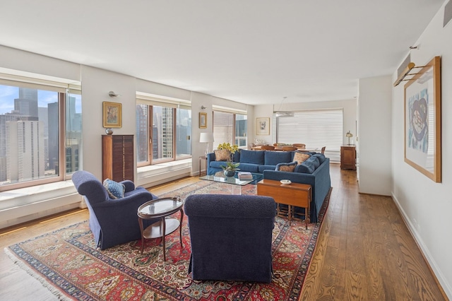 161 E Chicago Ave Unit 29De, Chicago, IL 60611 - living area featuring wood finished floors and healthy amount of natural light