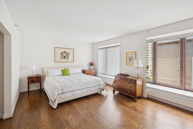 161 E Chicago Ave Unit 29De, Chicago, IL 60611 - bedroom featuring multiple windows and wood finished floors