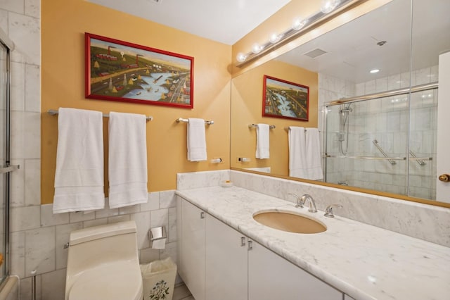 161 E Chicago Ave Unit 29De, Chicago, IL 60611 - bathroom with vanity, a tile shower, and tile walls