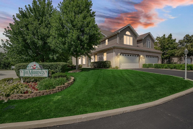 1 Moorings Dr, Palos Heights, IL 60463 - view of front of property featuring driveway, a garage, a yard, and brick siding