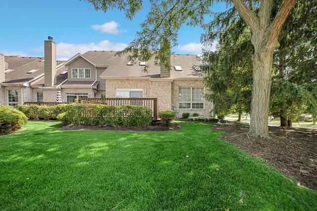 1 Moorings Dr, Palos Heights, IL 60463 - back of house with brick siding, a yard, and a chimney