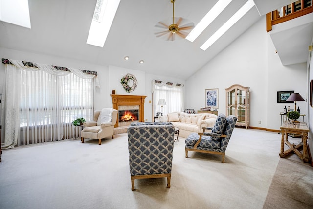 1 Moorings Dr, Palos Heights, IL 60463 - carpeted living area with a skylight, high vaulted ceiling, a tiled fireplace, and a ceiling fan