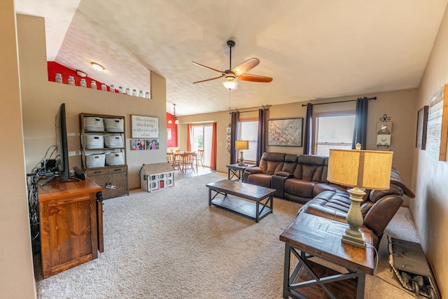 2030 Southfield Ln, Byron, IL 61010 - living area featuring a ceiling fan, carpet flooring, and vaulted ceiling
