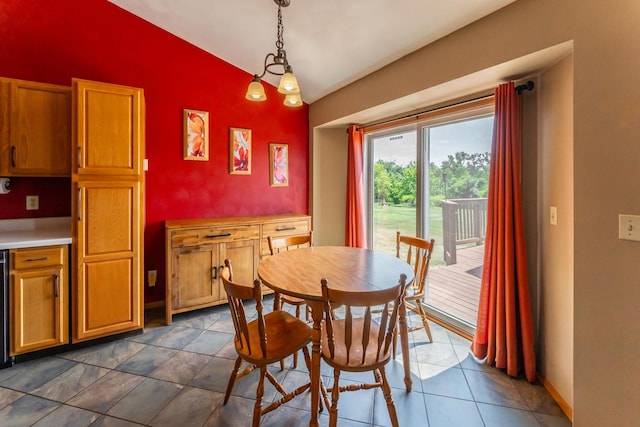 2030 Southfield Ln, Byron, IL 61010 - dining space featuring lofted ceiling and baseboards