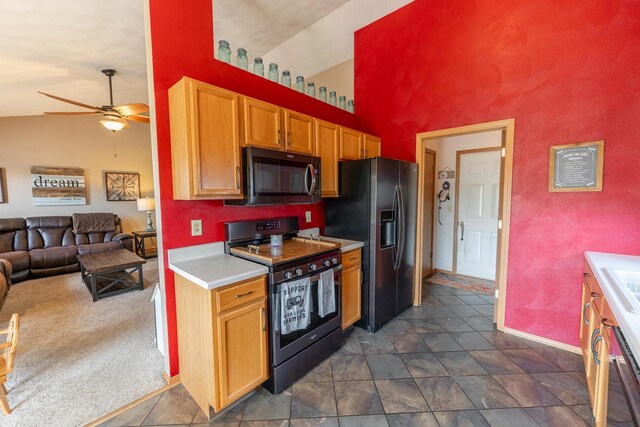 2030 Southfield Ln, Byron, IL 61010 - kitchen with black / electric stove, fridge with ice dispenser, ceiling fan, open floor plan, and light countertops
