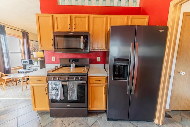 2030 Southfield Ln, Byron, IL 61010 - kitchen with appliances with stainless steel finishes and light countertops